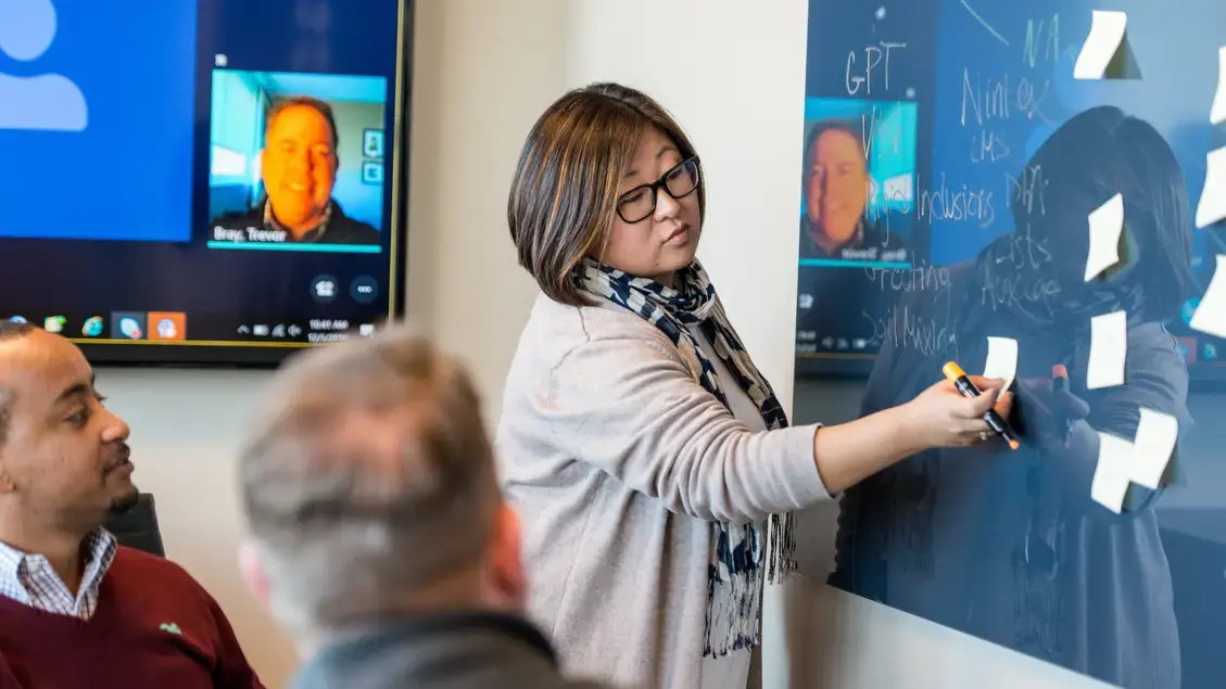 Employees from around the globe at a videoconference